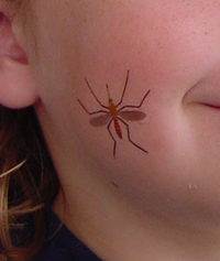 girl with mosquito tattoo